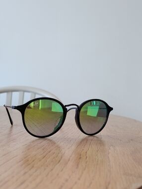 Ray-Ban Black Frame Sunglasses with Green Mirrored Lenses